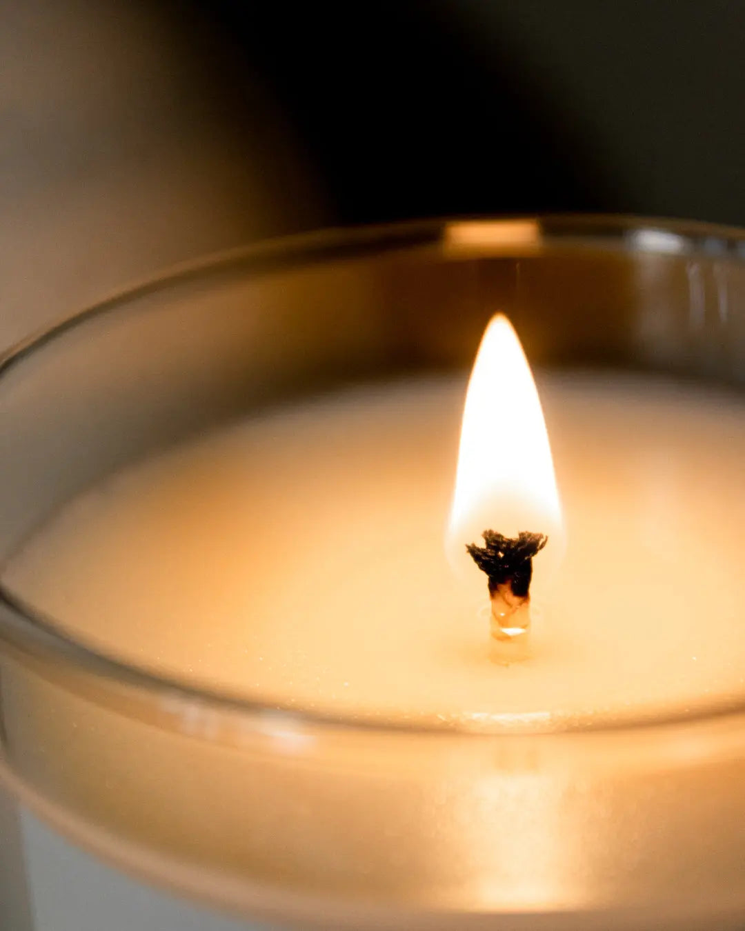 Tropical Serenity - Olethea London - close up of burning scented soy wax candle